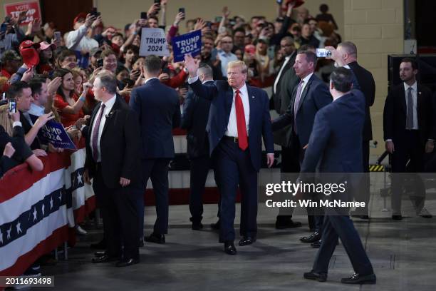 Republican presidential candidate, former U.S. President Donald Trump waves to supporters after speaking at a Get Out The Vote rally at the North...