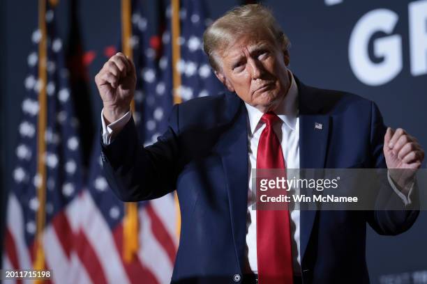 Republican presidential candidate, former U.S. President Donald Trump dances after speaking at a Get Out The Vote rally at the North Charleston...