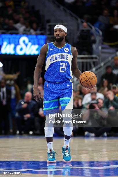 Patrick Beverley of the Milwaukee Bucks handles the ball during a game against the Miami Heat at Fiserv Forum on February 13, 2024 in Milwaukee,...