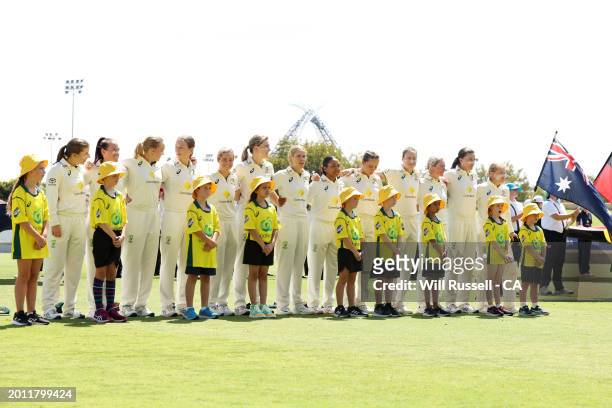 Australia observe the National Anthem during day one of the Women's Test Match between Australia and South Africa at WACA on February 15, 2024 in...