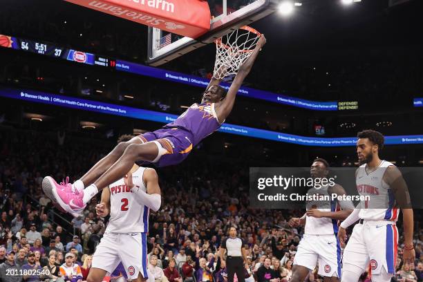 Bol Bol of the Phoenix Suns slam dunks the ball against the Detroit Pistons during the first half of the NBA game at Footprint Center on February 14,...