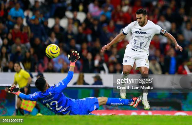 Camilo Vargas, goalkeeper of Atlas, fights for the ball with Eduardo Salvio of Pumas during the 9th round mach between Atlas and Pumas UNAM as part...