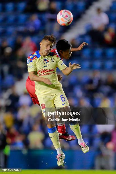 Jonathan Dos Santos of America fights for the ball with Harold Medina of Real Esteli during the second leg of the CONCACAF Champions League game at...