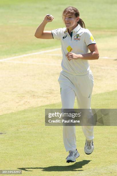 Annabel Sutherland of Australia celebrates the wicket of Sune Luus of South Africa during day one of the Women's Test Match between Australia and...