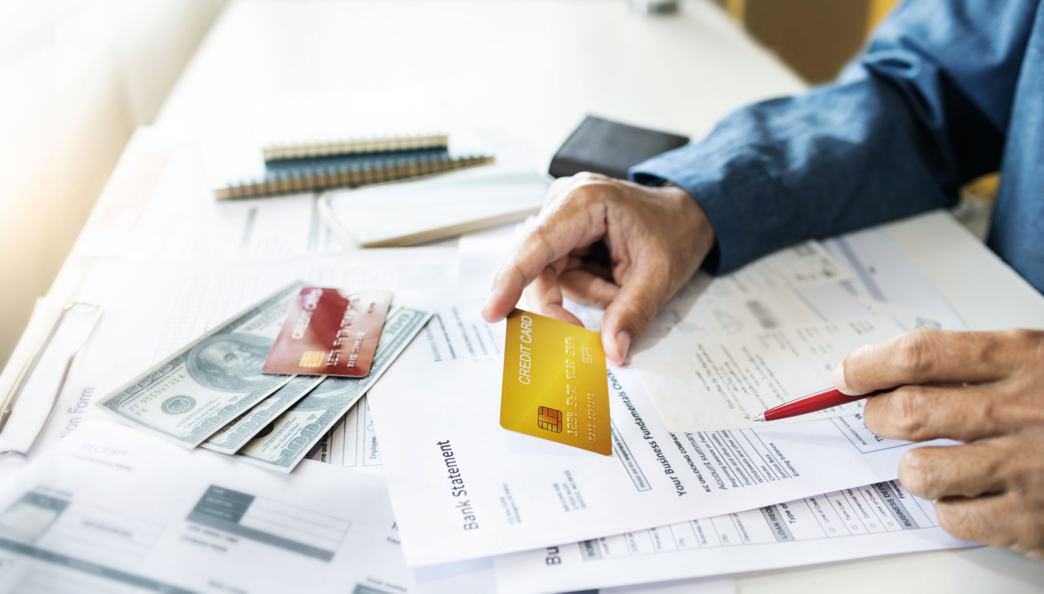 a man using and paying credit card a man using and paying credit card