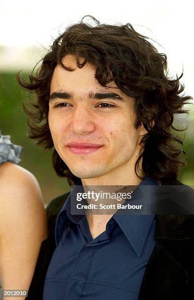 Actor Caio Blat poses for photographers during the "Carandiru" photocall at the Palais Des Festival during 56th International Cannes Film Festival...