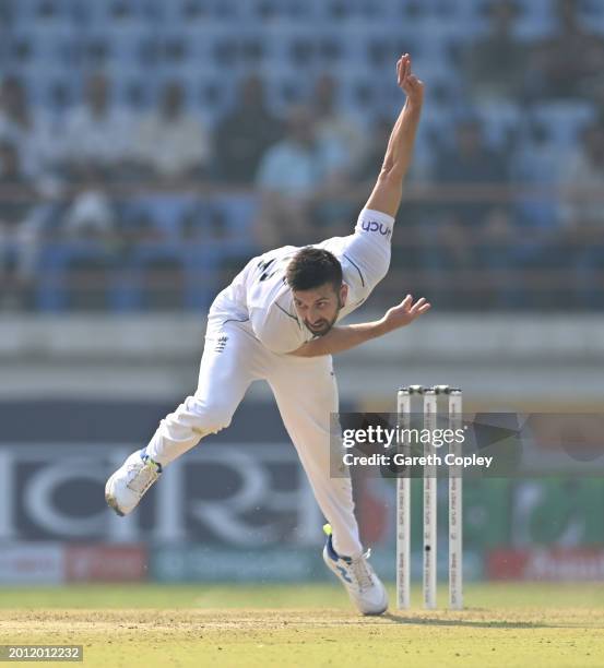 England bowler Mark Wood in bowling action during day one of the 3rd Test Match between India and England at Saurashtra Cricket Association Stadium...