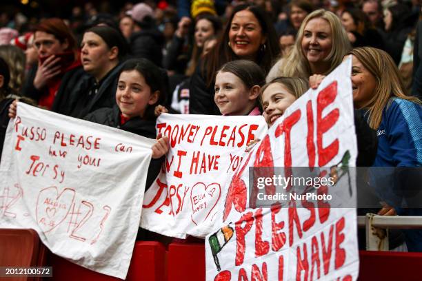 Young supporters are cheering during the Barclays FA Women's Super League match between Arsenal and Manchester United at the Emirates Stadium in...