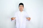 muslim man asian pointing to center