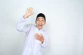 funny asian muslim man looking up