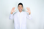 happy muslim man asian waving two