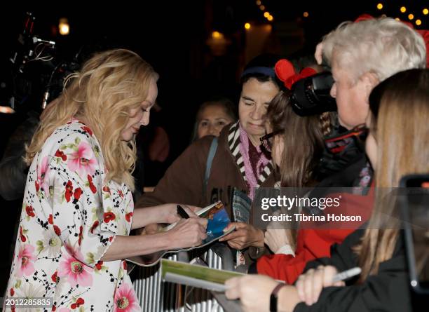 Virginia Madsen signs autographs at the Cinema Vanguard Award ceremony during the 39th Annual Santa Barbara International Film Festival on February...