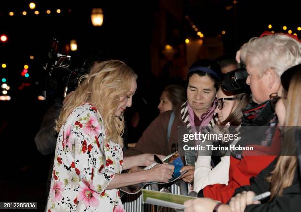 Virginia Madsen signs autographs at the Cinema Vanguard Award ceremony during the 39th Annual Santa Barbara International Film Festival on February...