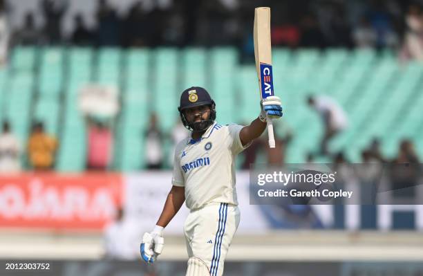 India batsman Rohit Sharma reaches his century during day one of the 3rd Test Match between India and England at Saurashtra Cricket Association...