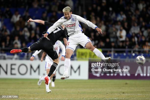 Gustav Ludwigson of Ulsan Hyundai and Yuta Imazu of Ventforet Kofu compete for the ball during the AFC Champions League Round of 16 first leg match...