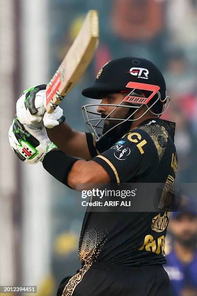 Peshawar Zalmi's captain Babar Azam plays a shot during the Pakistan Super League Twenty20 cricket match between Peshawar Zalmi and Quetta Gladiators...