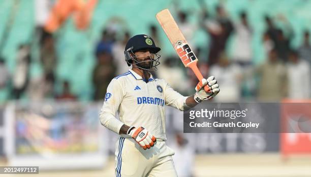 India batsman Ravindra Jadeja celebrates his century during day one of the 3rd Test Match between India and England at Saurashtra Cricket Association...