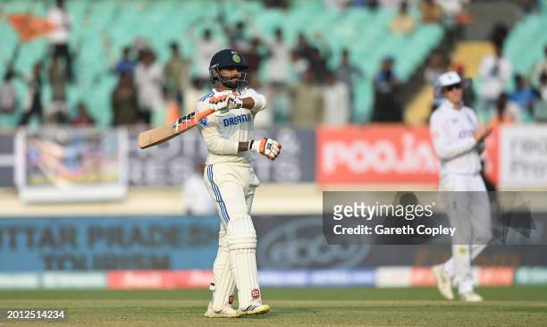 India batsman Ravindra Jadeja celebrates his century during day one of the 3rd Test Match between India and England at Saurashtra Cricket Association...