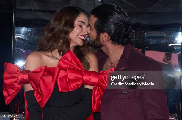 Claudia Martin and Hugo Catalan kisses during a presentation of `El amor no tiene receta´ soap at Televisa San Angel on February 14, 2024 in Mexico...