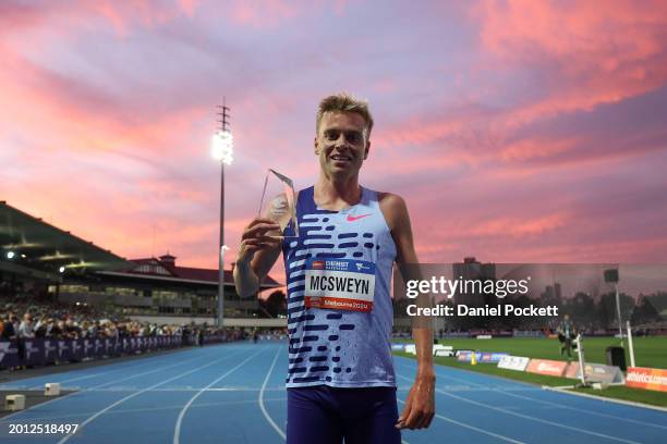 Stewart McSweyn of Australia poses for a photograph with the trophy after winning the Men's John Landy Mile during the 2024 Maurie Plant Meet at...