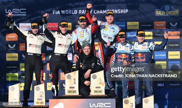 Second placed Elfyn Evans of Great Britain and his co-driver Scott Martin of Great Britain, winner Esapekka Lappi of Finland and his co-driver Janne...