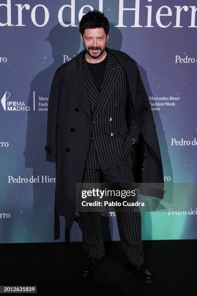 Alvaro Morte attends the photocall ahead of Pedro del Hierro's fashion show during the Mercedes Benz Fashion Week Madrid at Ifema on February 15,...