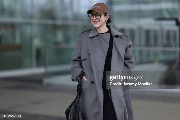 Maria Barteczko seen wearing Victoria Beckham black oversized aviator glasses, silver earrings, Celine brown logo baseball cap, Soft Goat black...