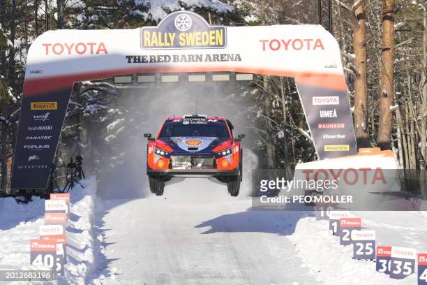Esapekka Lappi of Finland and his co-driver Janne Ferm of Finland compete during the final race of the FIA World Rally Championship near Umea,...