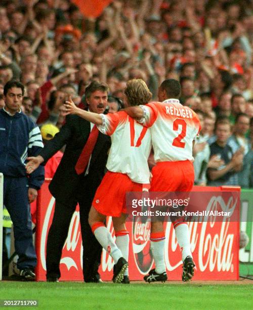June 13: Michael Reiziger and Jordi Cruyff of Holland celebrates with Guus Hiddink Manager of Holland during the UEFA Euro 1996 Group A match between...