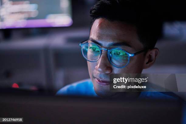 businessman, computer or programming code in night office for software development, cybersecurity or database safety. asian programmer, developer or engineer on technology for web 3.0 coding in dark - webdesigner stockfoto's en -beelden