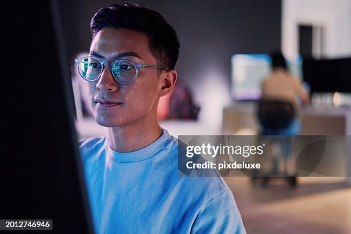 Computer coding, programming and asian man in cybersecurity, software development and html script. Night person from china with information technology career, database code and monitor network safety Computer coding, programming and asian man in cybersecurity, software development and html script. Night person from china with information technology career, database code and monitor network safety