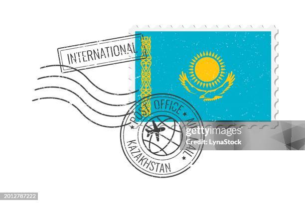 kazakhstan grunge postage stamp. vintage postcard vector illustration with kazakhstan national flag isolated on white background. retro style. - kazakhstan flag stock illustrations