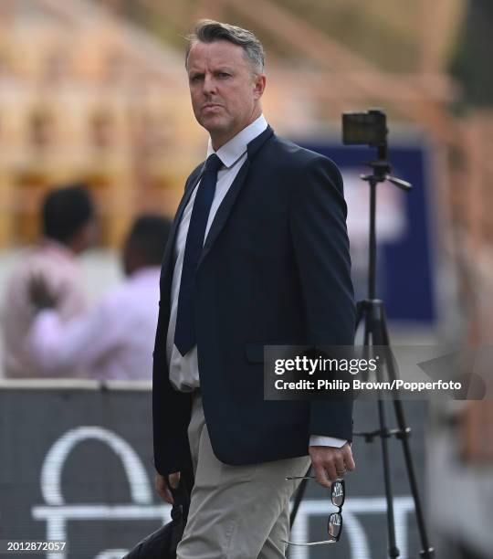 Graeme Swann looks on after day one of the 3rd Test Match between India and England at Saurashtra Cricket Association Stadium on February 15, 2024 in...