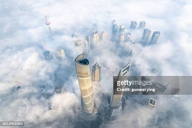 shanghai skyline in heavy fog - 上海 stock pictures, royalty-free photos & images