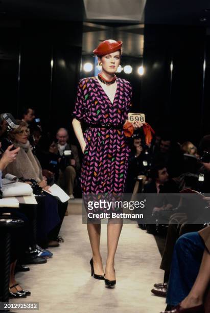 Model wearing a black and purple shell print dress from Chanel's collection for spring and summer, Paris, January 30th 1979.