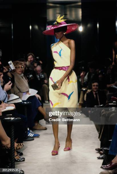 Model wearing a feather print dress from Chanel's collection for spring and summer, Paris, January 30th 1979.