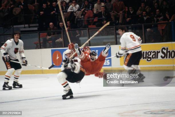Mike Bossy of the NHL All Star team colliding with the USSR's Sergei Makarov during the third 1979 Challenge Cup game in New York, February 11th 1979.