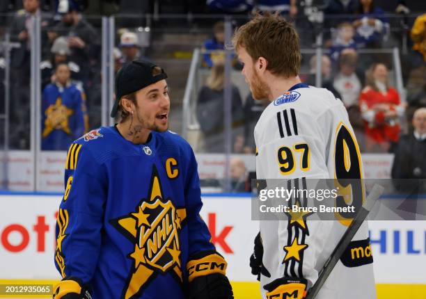 Justin Bieber poses with Connor McDavid of the Edmonton Oilers prior to the 2024 NHL All-Star Game on February 03, 2024 in Toronto, Ontario, Canada.