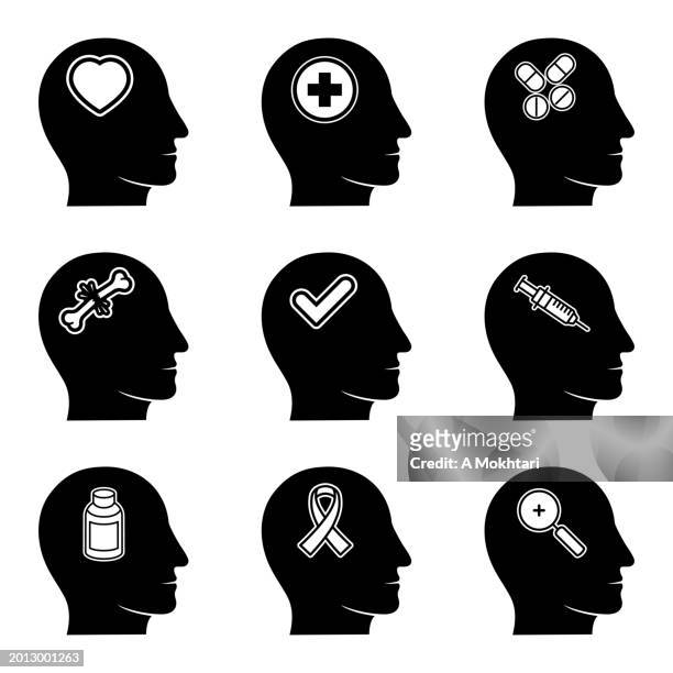 set of icons of man head silhouettes with different ideas. - brain cancer stock illustrations