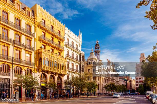 plaza del ayuntamiento square with historic buildings on a sunny day, valencia, spain - valence espagne photos et images de collection