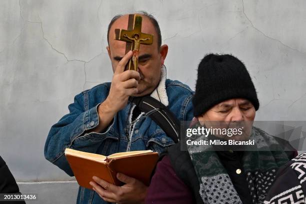Greek-Orthodox people participate in a protest against the legislation of same sex-marriages and adoption by same-sex couples, on February 15, 2024...