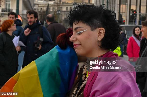 People react as supporters of the bill which legalises same-sex civil marriage gather in front of the Greek parliament, ahead of the vote, on...