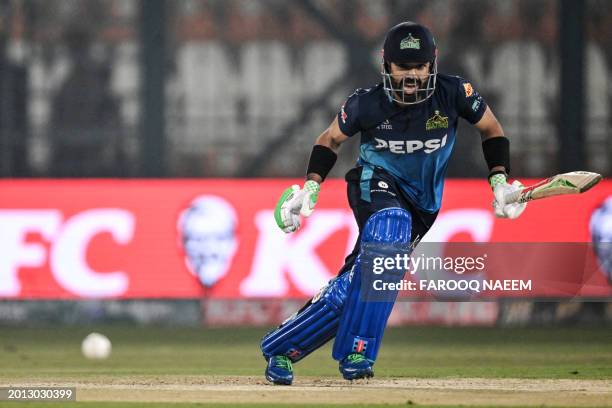 Multan Sultan's Mohammad Rizwan runs between the wickets during the Pakistan Super League Twenty20 cricket match between Multan Sultans and Karachi...