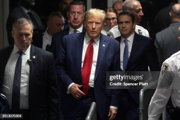 Republican presidential candidate, former U.S. President Donald Trump departs a pre-trial hearing in a hush-money case at Manhattan Criminal Court on...