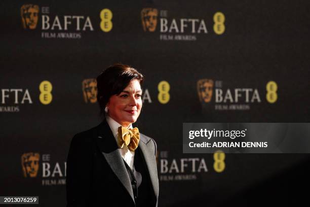 Director General of the British Academy of Film and Television Arts Jane Millichip poses on the red carpet upon arrival at the BAFTA British Academy...