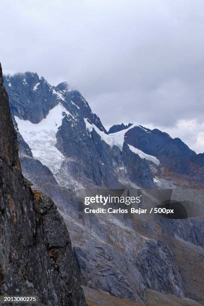 scenic view of snowcapped mountains against sky - viajes stock pictures, royalty-free photos & images