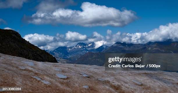 scenic view of snowcapped mountains against sky - viajes stock pictures, royalty-free photos & images