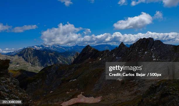 panoramic view of snowcapped mountains against sky - viajes stock pictures, royalty-free photos & images