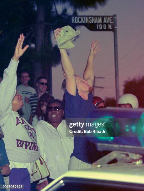 Los Angeles Police Department officers arrive and do crowd control at Rockingham Avenue and Sunset Boulevard following OJ Simpson freeway police...