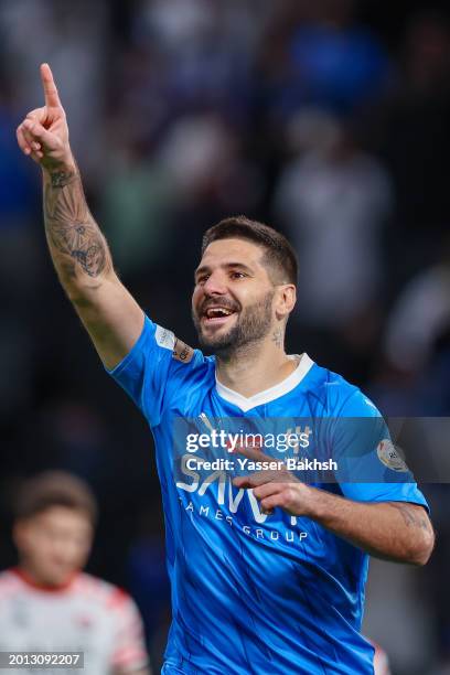Aleksander Mitrovic of Al Hilal celebrates after scoring 1st goal during the Saudi Pro League match between Al-Hilal and Al-Raed at Kingdom Arena on...